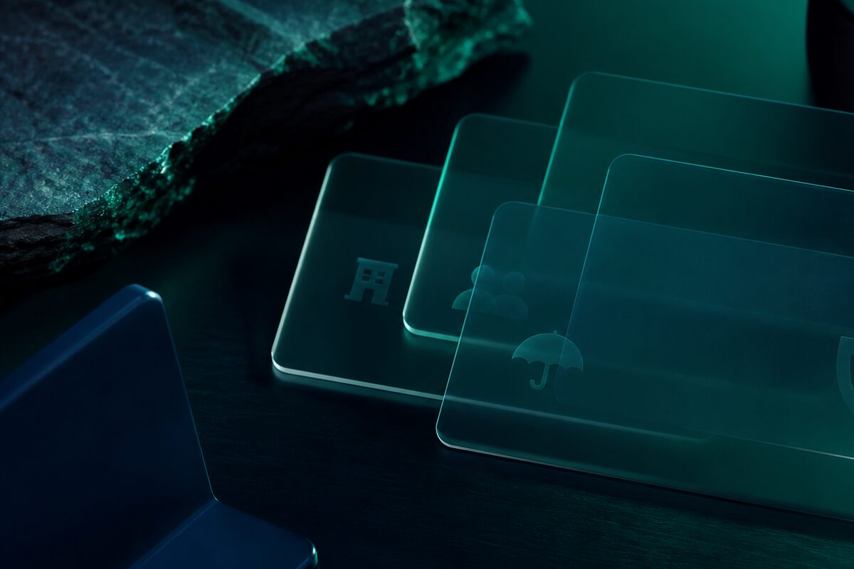 Translucent benefit cards layered on a dark surface